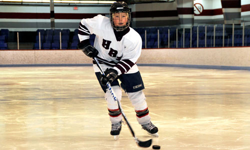 Young hockey player skating